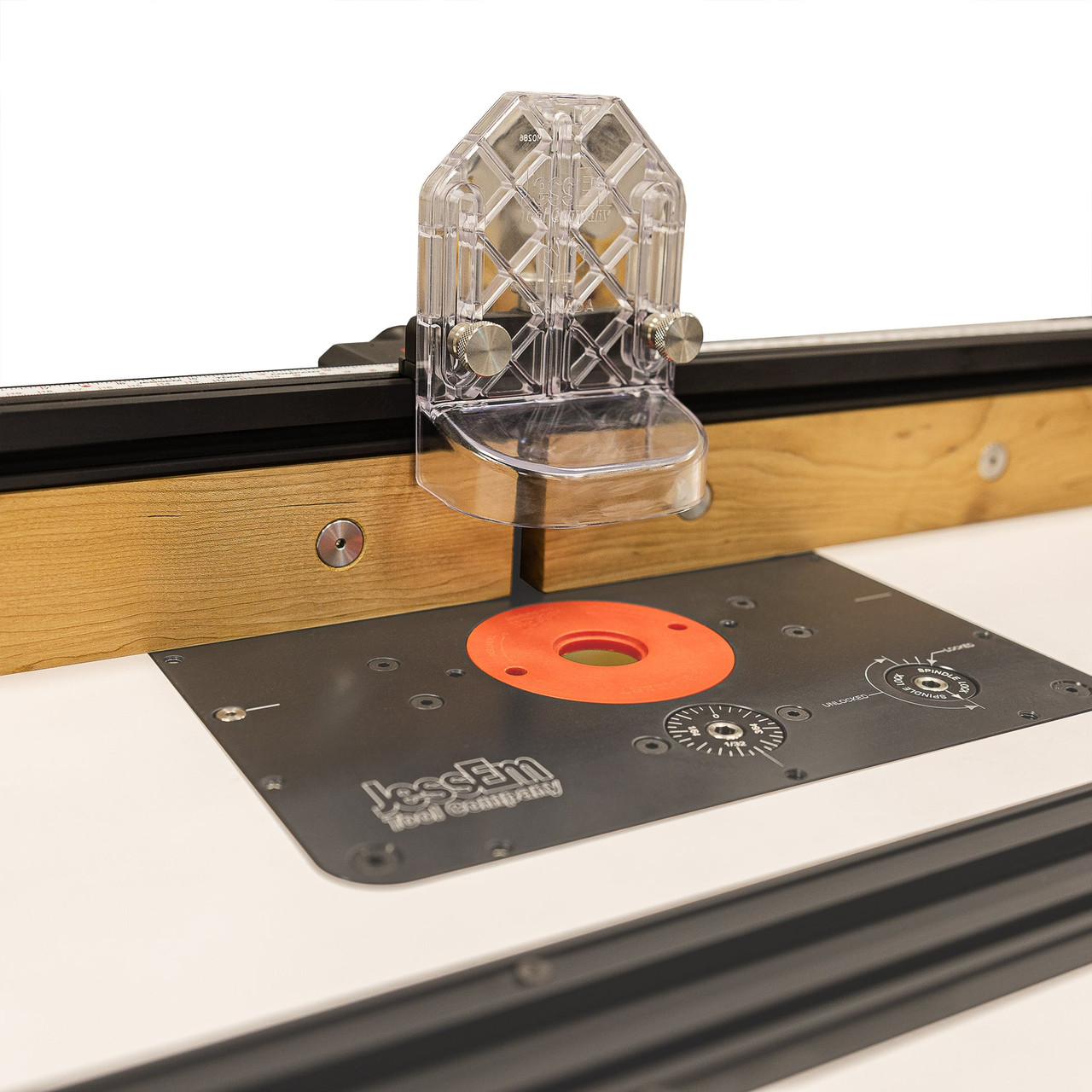 Mast-R-Fence III installed on table with split faces and clear guard centered over bit